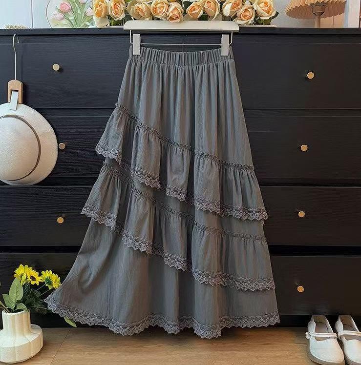 

Жіноча весняна солодка багатошарова спідниця з воланами - Еластична талія, Стройняща, Універсальна One Size сірий колір