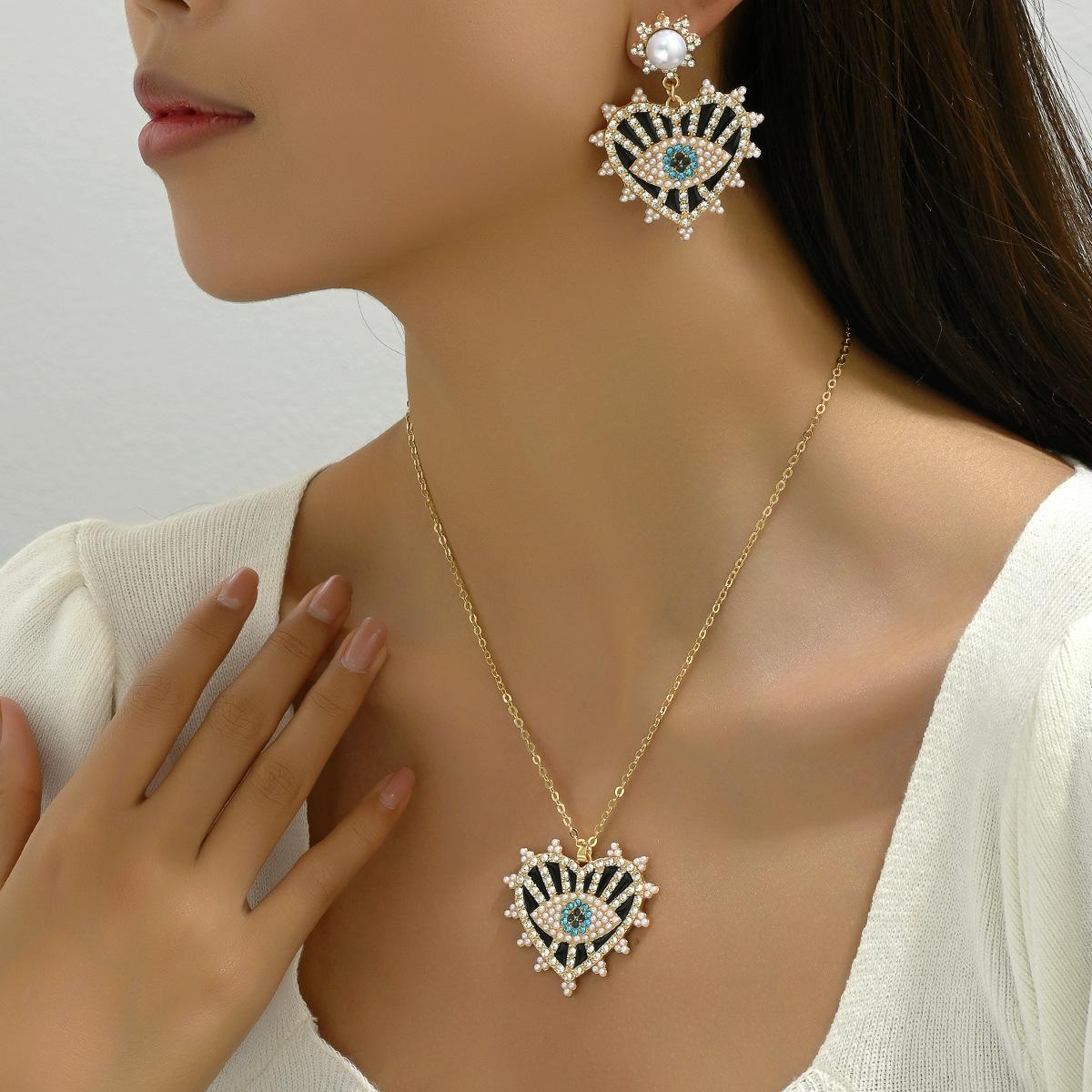 

Горячая Распродажа хип-хоп ретро женские ожерелья серьги с бриллиантами в виде глаза дьявола серьги-гвоздики длинная цепочка