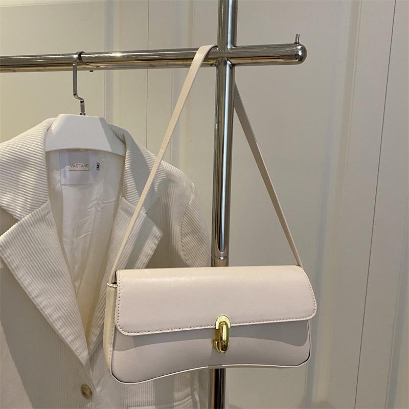 French personality trendy foreign style retro underarm portable shoulder bag underarm shoulder women's bag solid color 2025 new fashion