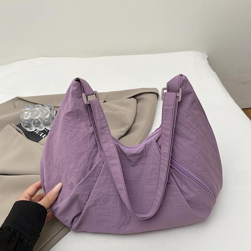Bolso cruzado de nailon estilo callejero con cierre de cremallera para uso diario