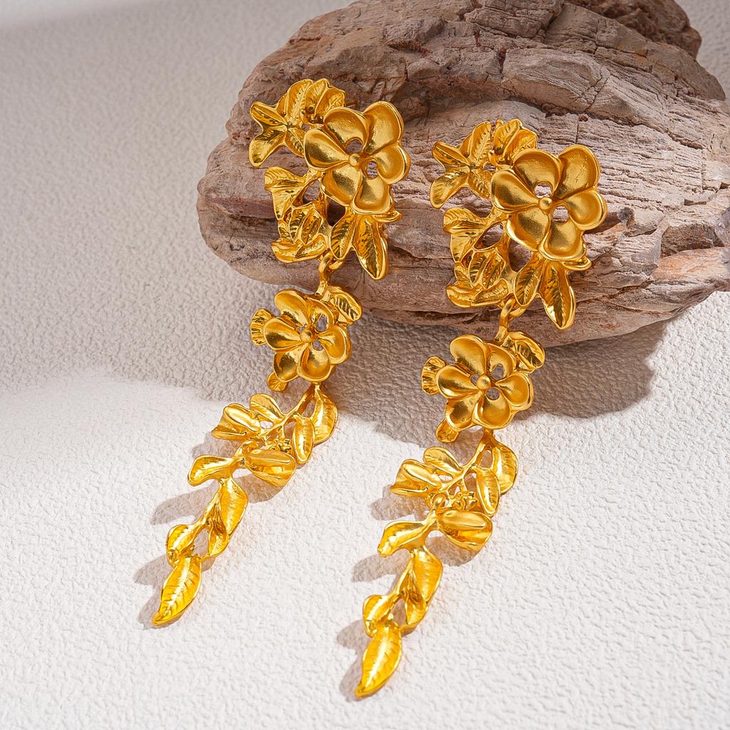 Metal flower leaf silver needle earrings exaggerated personality court style environmental protection earrings