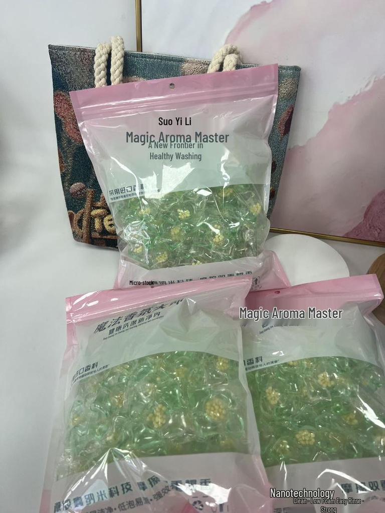 DM Camellia Scent Laundry Pods with Long-Lasting Fragrance, Stain Removal, and Softening Beads.