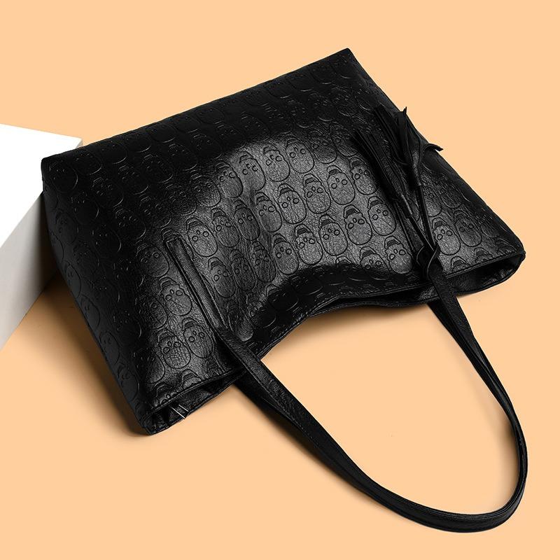 Simple solid color large capacity portable shoulder large bag skull printing soft leather versatile tote bag