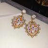 Silver Needle Leopard Print Diamond Tassel Earrings with Retro Ethnic Style and Unique Design.