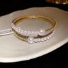 Elegant Diamond-Studded Geometric Multi-Layer Open Bangle - Luxurious French High-End Jewelry.