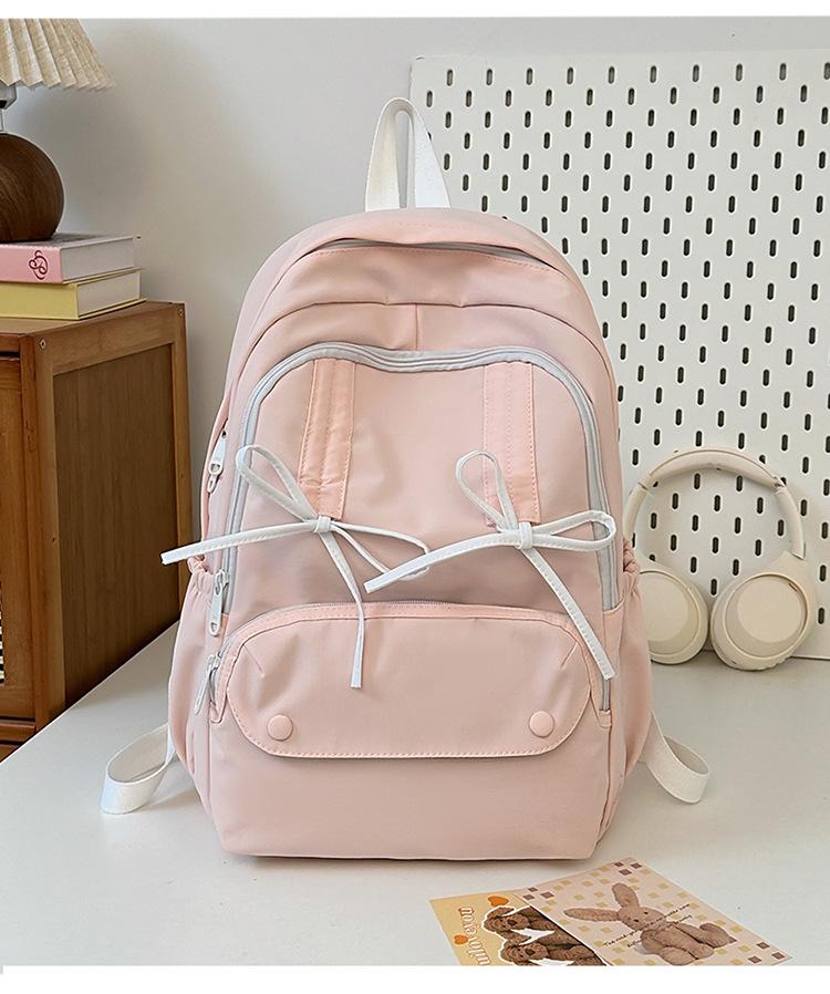 

Japanese ins new high-value, fresh and sweet candy-colored backpack, lightweight and large-capacity backpack for junior high school students Single pack рожевий