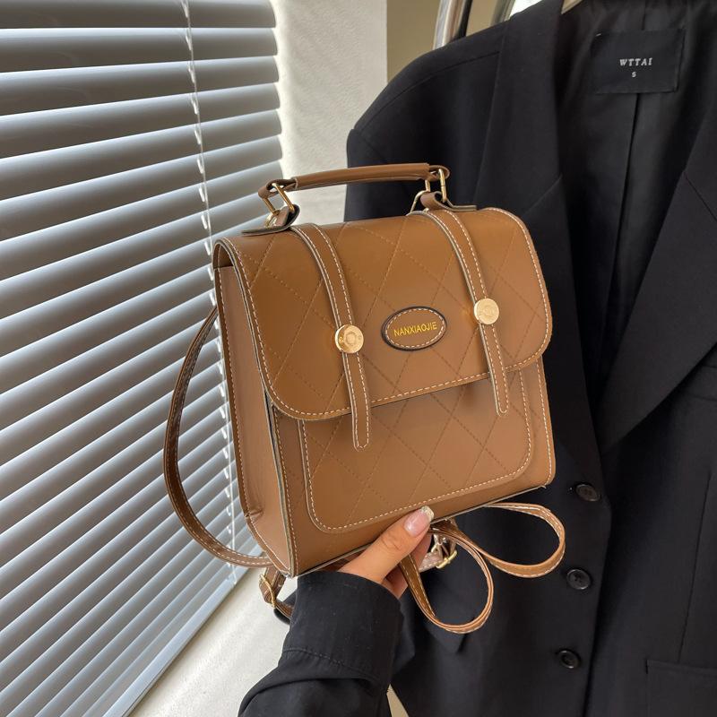 

Преміум жіноча сумка жіноча літо 2024 новий рюкзак діамант преміальна текстура сумка через плече коричневий