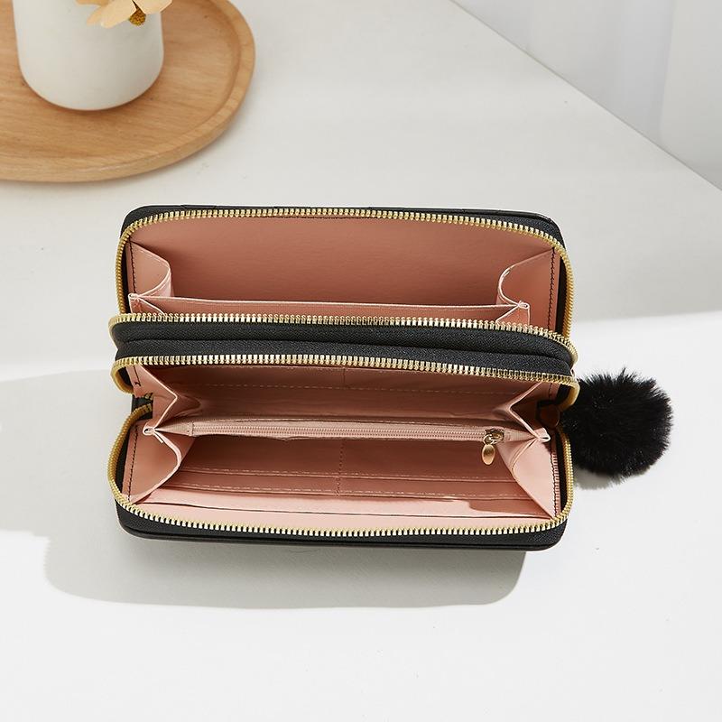 Women's long double-layer wallet, new oblique pattern embroidery hairball decoration, hand-held change bag, casual bag, one generation