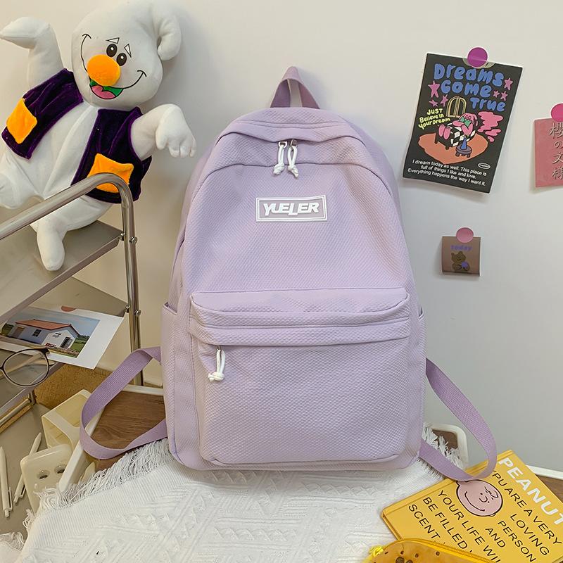 Student backpack Women's new large-capacity outdoor lightweight schoolbag Middle school student candy-colored backpack