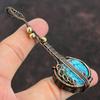 Tybetański Turkusowy Wisiorek Oplatany Miedzianym Drutem Ręcznie Robiony Wisiorek Gitara Prezent Kamień Szlachetny Turkus Długa Biżuteria Biżuteria Instrument Muzyczny