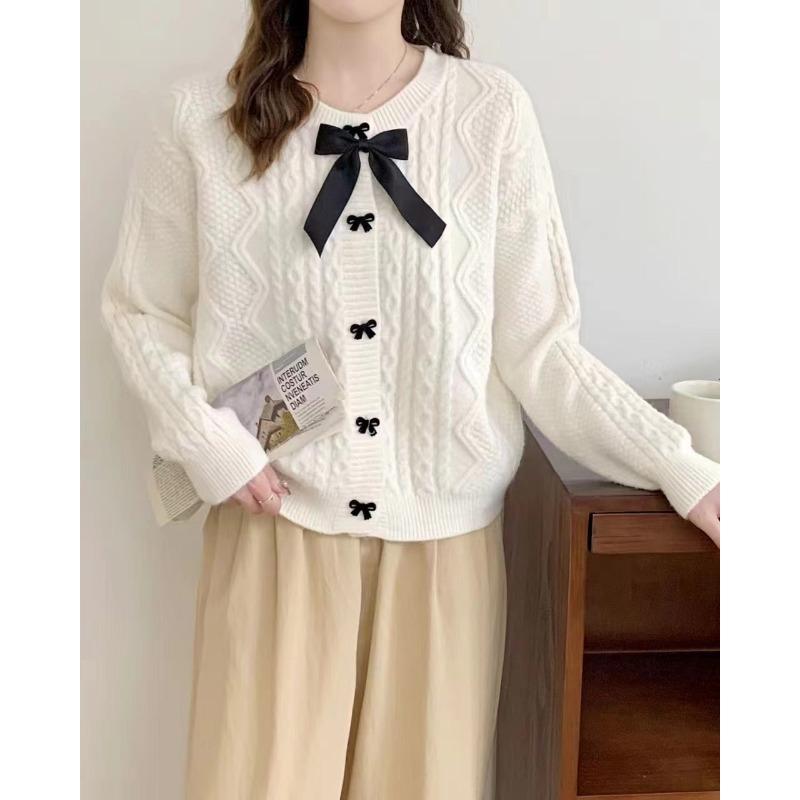 Solid color knitted cardigan women's new autumn and winter bow button with twist sweater jacket