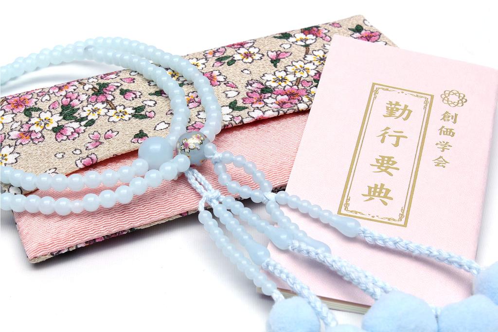 Japanese-made Soka Gakkai prayer beads set, perfect as a gift for new members. Includes a pink and cherry blossom design on the beads and a light blue