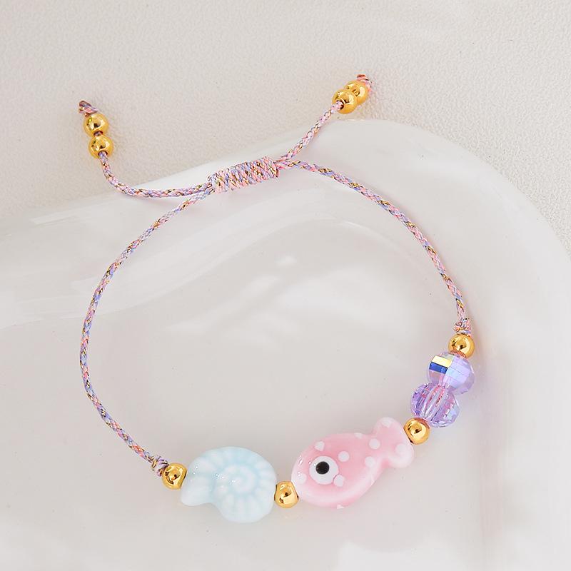 Bohemian Handmade Braided Rope Bracelet with Small Fish and Conch Charms