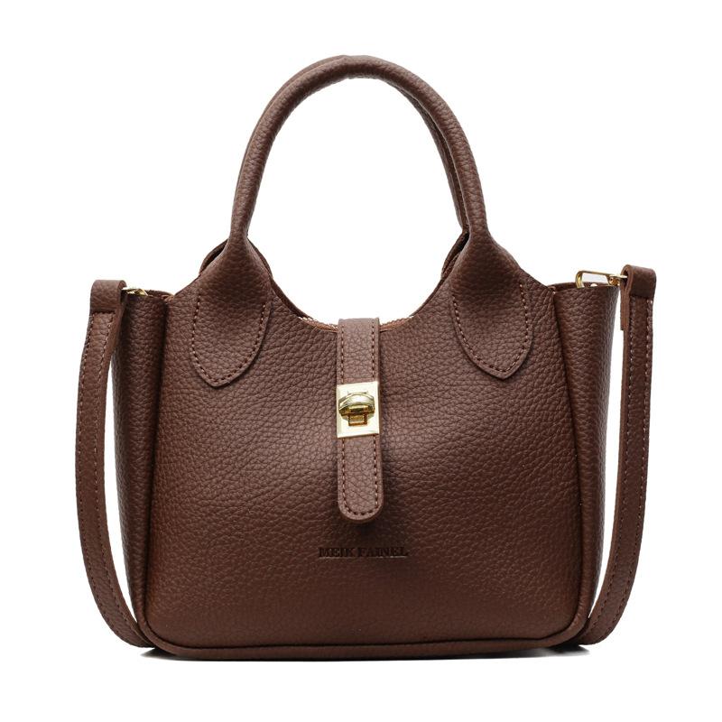 

Summer leisure, high-end sense, fashion temperament, portable bucket bag, women s versatile lychee pattern texture, light luxury messenger bag темно-коричневого