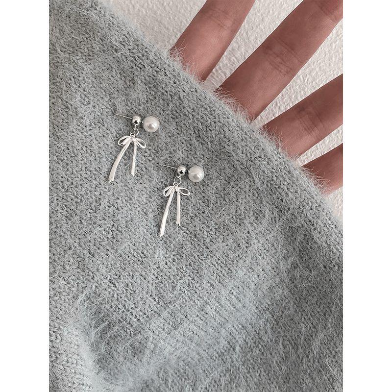 

Серьги-пусеты из стерлингового серебра 925 пробы с жемчугом и бантом, женские, 2024, новинка, самые продаваемые, доступная роскошь, необычные серьги, серьги для особых случаев Pair of Pearl Bows stud earrings