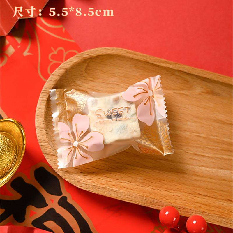 100Pcs 5.5x8.5cm Small Nougat Candy Chinese New Year Snowflake Crispy Packaging Machine Sealing Bags