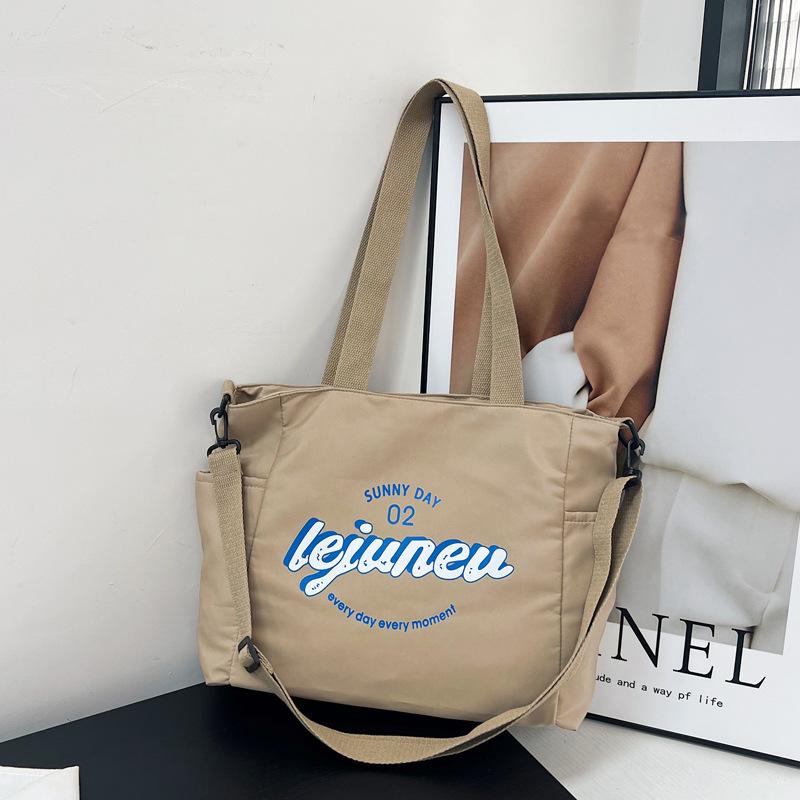 

Nylon graffiti printed bag women s 2025 literary and simple female college student shoulder bag large capacity underarm tote bag one size fits all хакі