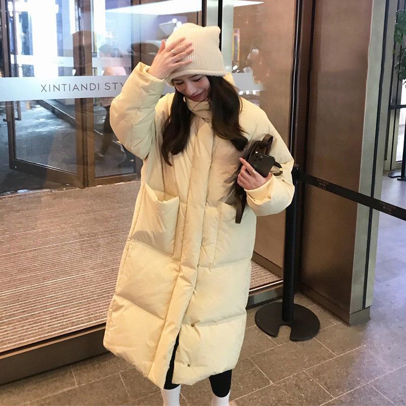 Stand-up collar medium and long down jacket women's solid color large pocket thickened white duck down warm jacket tide