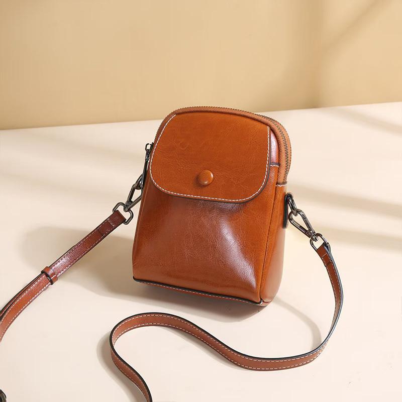 Leather small bag women's new spring and summer fashion vertical mobile phone bag cowhide multi-layer versatile shoulder messenger bag