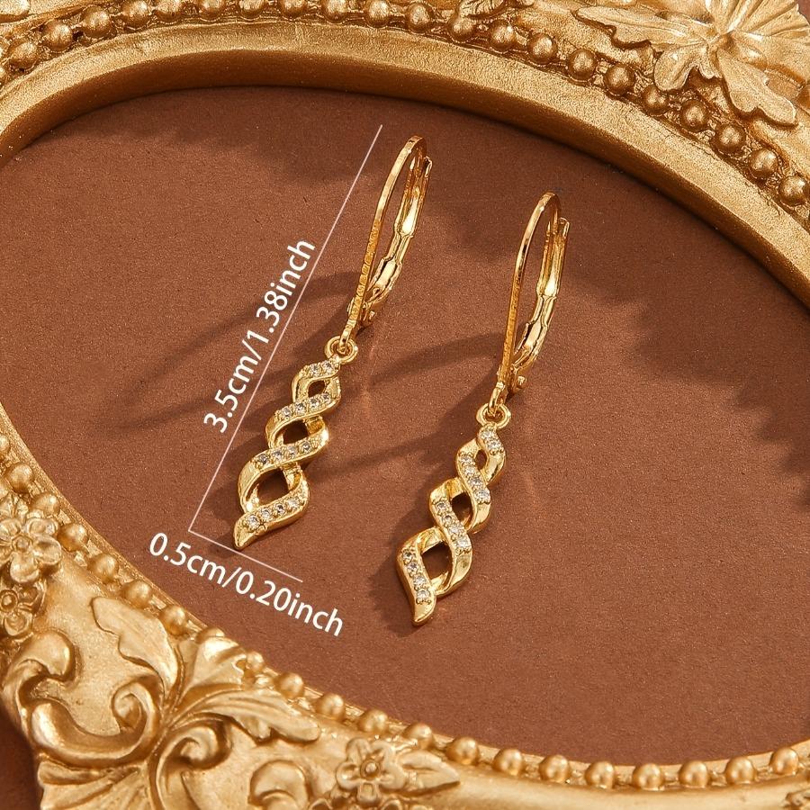 Ein Damen-Ohrklemme aus 18 Karat vergoldetem, geflochtenem, verdrehtem Design mit eingelassenen synthetischen Zirkonia-Steinen, Lange Ohrringe, mit einem einfachen, eleganten