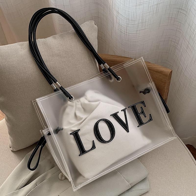 

Сумка большой вместимости женская летняя универсальная новая на плечо прозрачная сумка-желе текстура сумка-тоут для матери и ребенка No specification белый