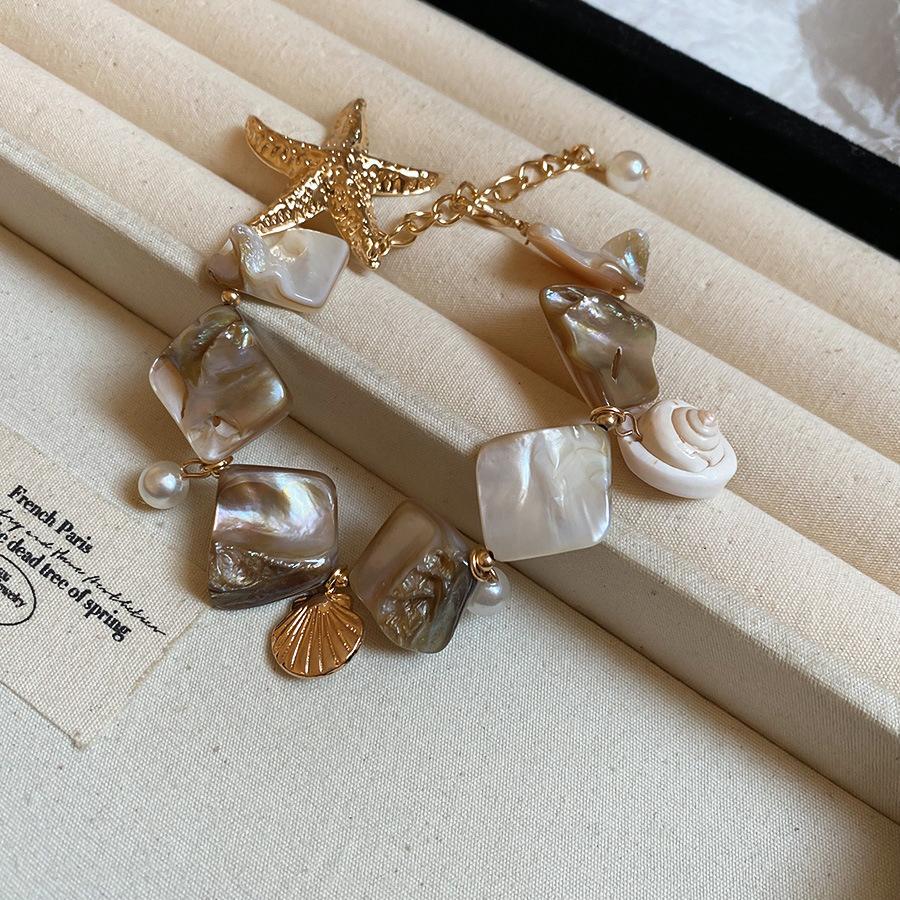 

Shell Starfish Conch Necklace Beach Seaside Resort Temperament Collarbone Chain European and American Fashion Versatile Necklace