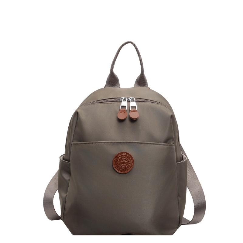 

Backpack Women s Fashion New Versatile Commuter Large Capacity Oxford Cloth Lightweight Small Bag Trendy Simple Backpack серый