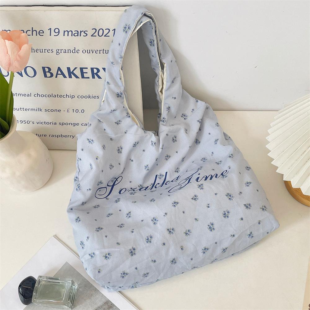 

Girl print blue broken flower canvas bag hand-held niche student letter large capacity shoulder bag