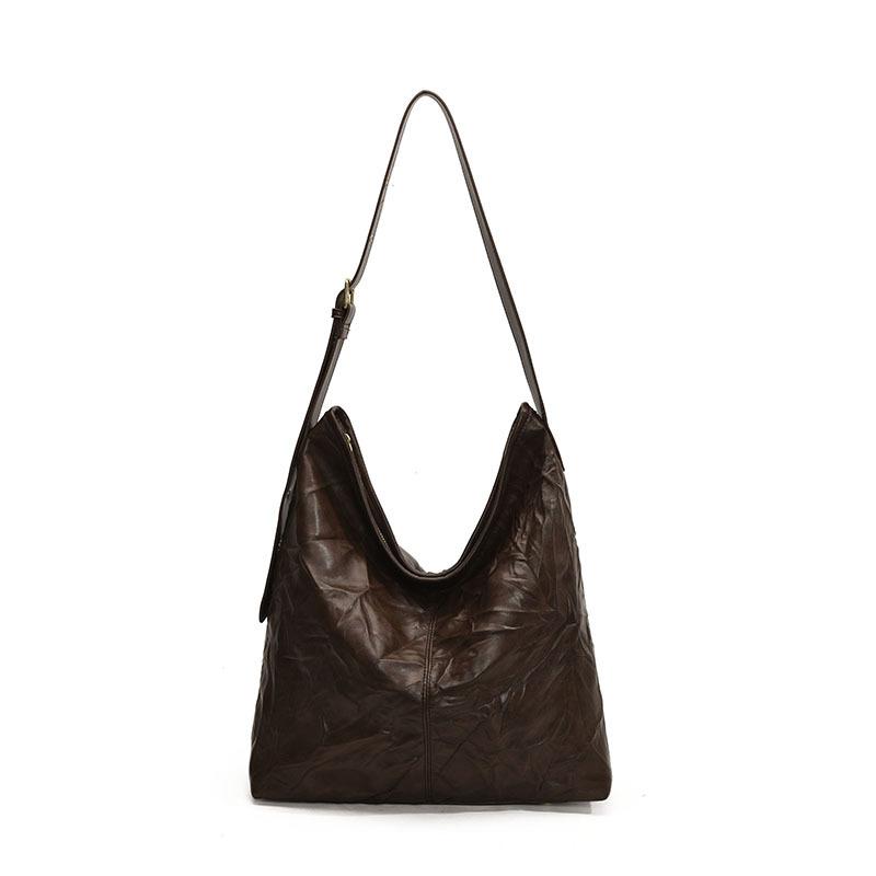 

2025 new casual lazy wind pleated tote bag commuting versatile large capacity soft leather solid color messenger women s bag