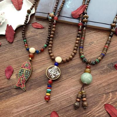 Lange nepalesische Retro-Ethno-Halskette mit Hühnerflügelholz und Bodhi-Perlen – Unisex-Modeaccessoire