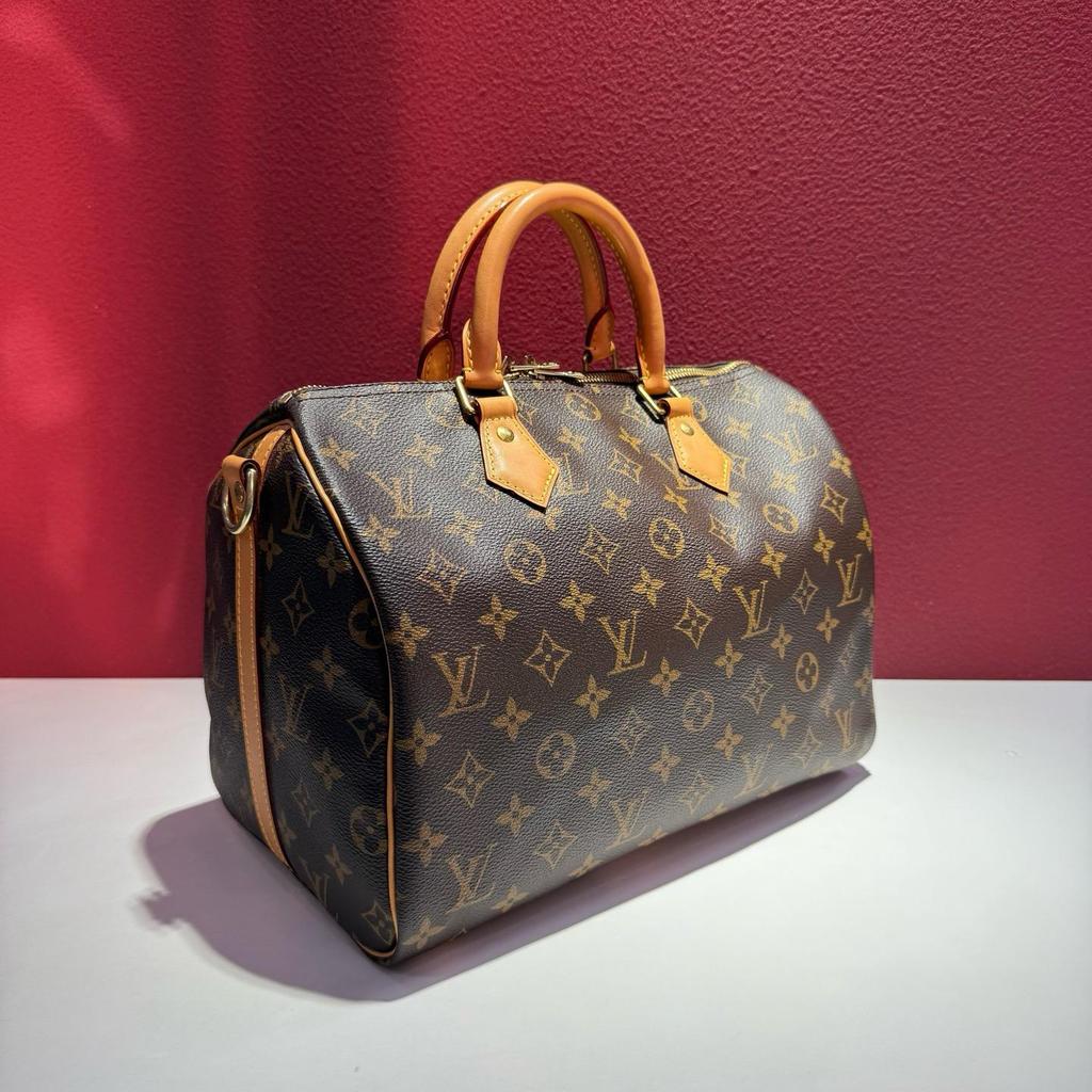 [Pre-Owned] Speedy 30 Iconic Design Rolled Handle Engraved Lock Detachable Adjustable Shoulder Strap Coated Canvas Smooth Leather - Very Good #1DZ6GFI