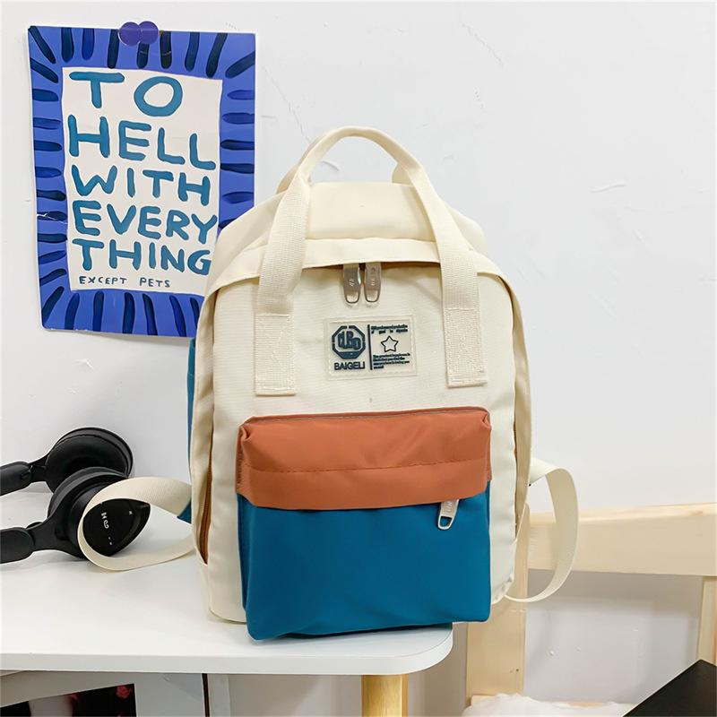 Girls casual small backpack Korean version of Harajuku high school female middle school student ins Japanese contrasting color backpack female
