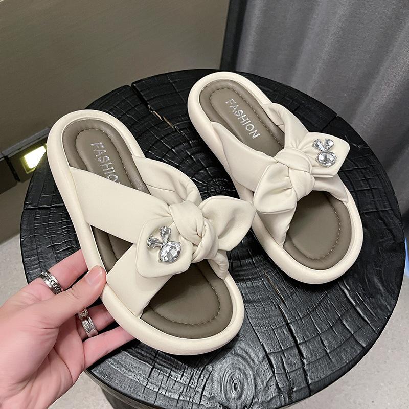 

2024 summer new bow women s slippers Korean version of fashion open-toed beach shoes wear Roman shoes 35