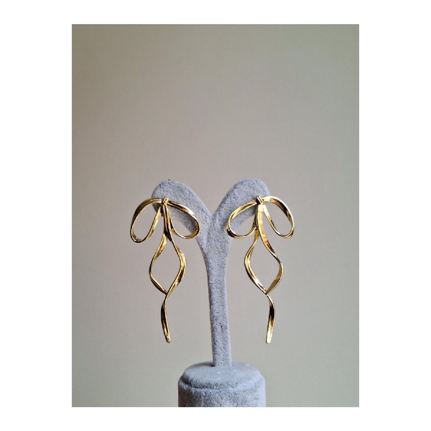 

Steel Bow Earring Gold 7 cm золотий