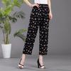 Damskie spodnie codzienne elastyczny pas nadruk w kwiaty luźny krój spodnie z kieszeniami praca