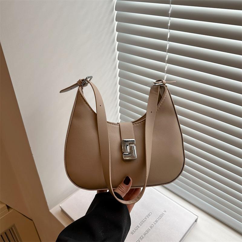 

This year s popular bag women s 2025 super fire fashion high sense foreign style shoulder underarm bag niche design messenger bag хаки