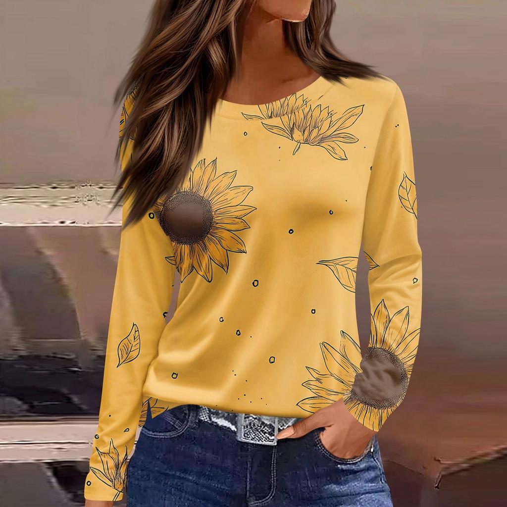 Dames casual T-shirt met split aan de zoom, ronde hals, lange mouwen en losse print.