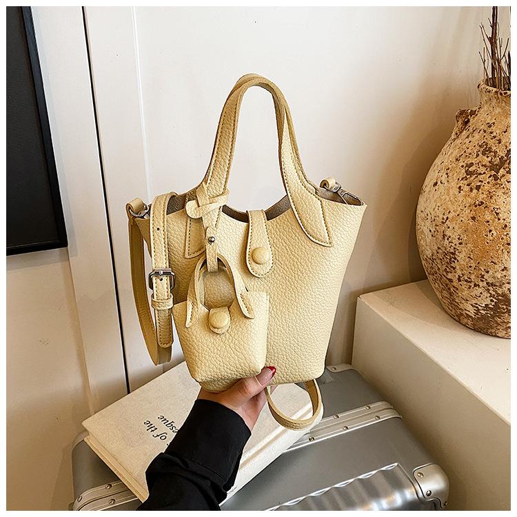 

Bucket bag women s new light luxury high-end commuter portable shoulder bag messenger bag vegetable basket жовтий