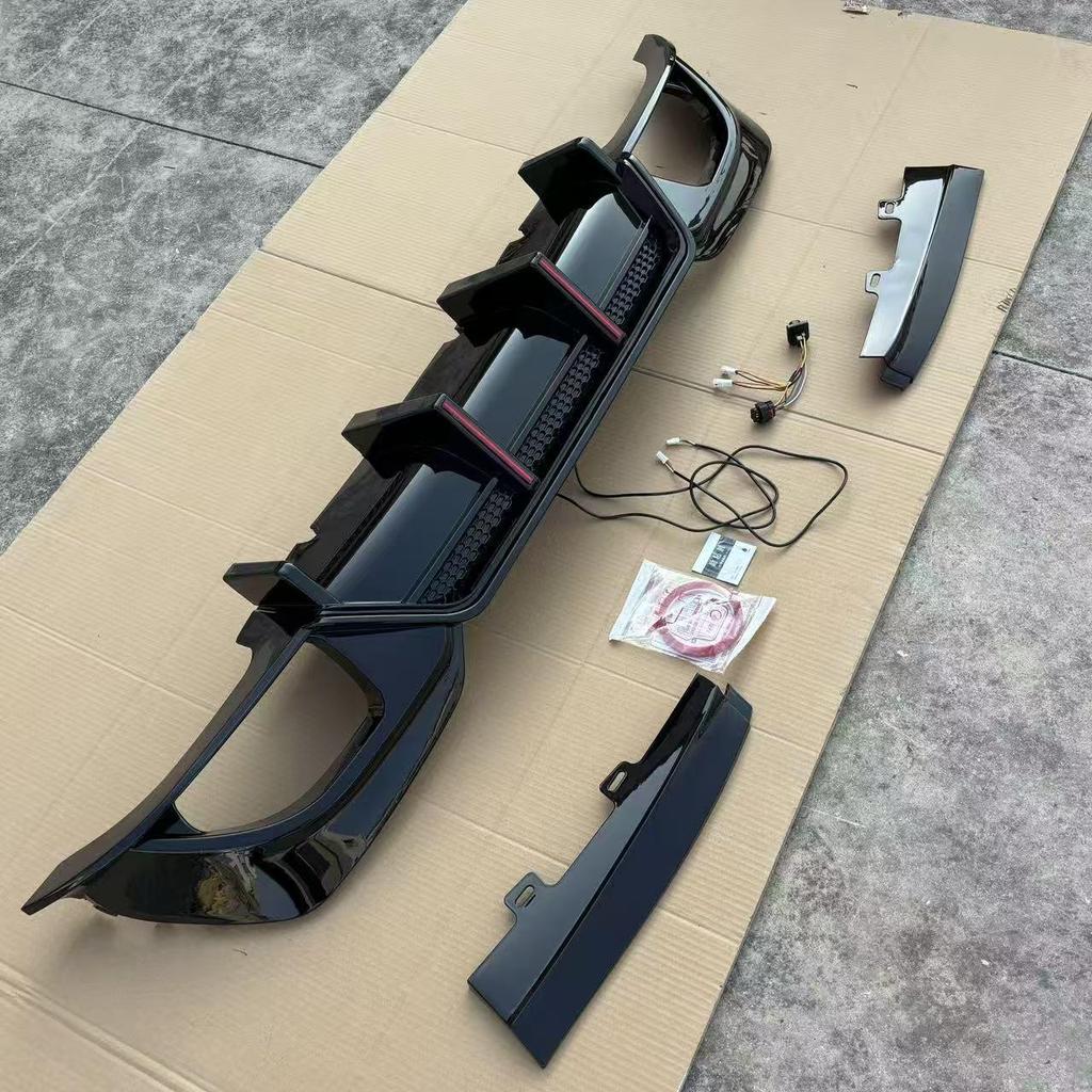 Fit for BMW 3 Series 20-22 G20/G28 Gloss Black Carbon Fiber Rear Diffuser with Dual Vertical Lights.