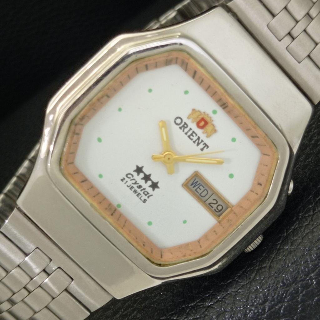 

Orient КРИСТАЛЛ АВТОМАТ 46941 ВИНТАЖ ЯПОНИЯ МУЖСКИЕ ЧАСЫ С БЕЛЫМ ЦИФЕРБЛАТОМ a703583-1 R213d-a703583