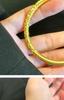 Elegant Coiled Grass Pattern Bracelet: Colorfast, High-End Chinese Style, Perfect Simple Gift for Weddings or Birthdays.