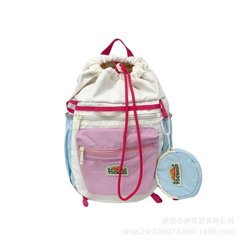 Schoolbag Korean contrasting color Macaron backpack 1011 new lightweight and cute kindergarten schoolbag drawstring backpack wholesale