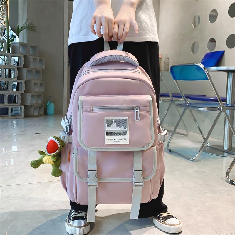 

New middle and high school students schoolbag large capacity boys and girls couple trend backpack фіолетовий