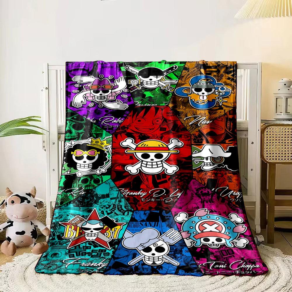 

The pattern shows stylized skull logos representing diverse themed characters. for all seasons blanket lunch break throw gift 80cm x 120cm
