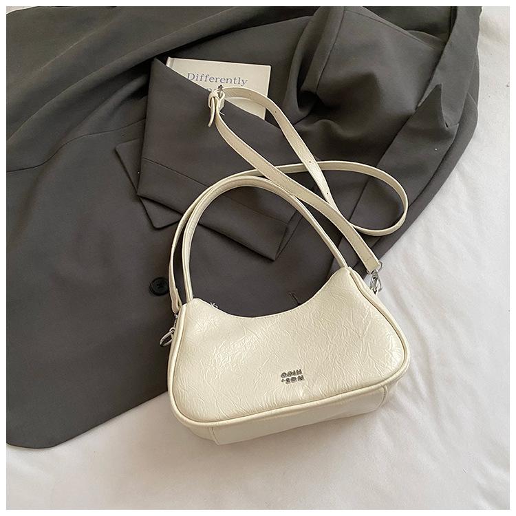 

Маленькая сумка высокого класса женская лето 2025 новая модная нишевая дизайнерская сумка-мессенджер сумка на плечо под мышку