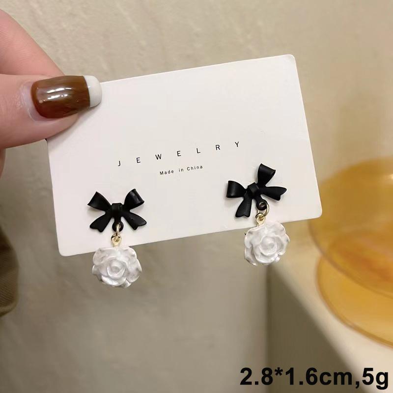 

Black White Women s Hanging Earrings Hollow Heart Pendants Elegant Female Bowknot Drop Earrings Korean Fashion Ear Decoration