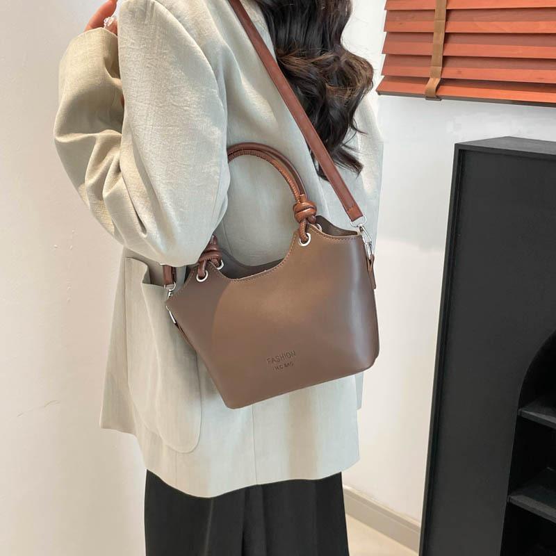 Neue Frühjahrs- und Sommermode vielseitige Pendler-Umhängetasche beliebte Textur Damentasche tragbare Bucket Bag