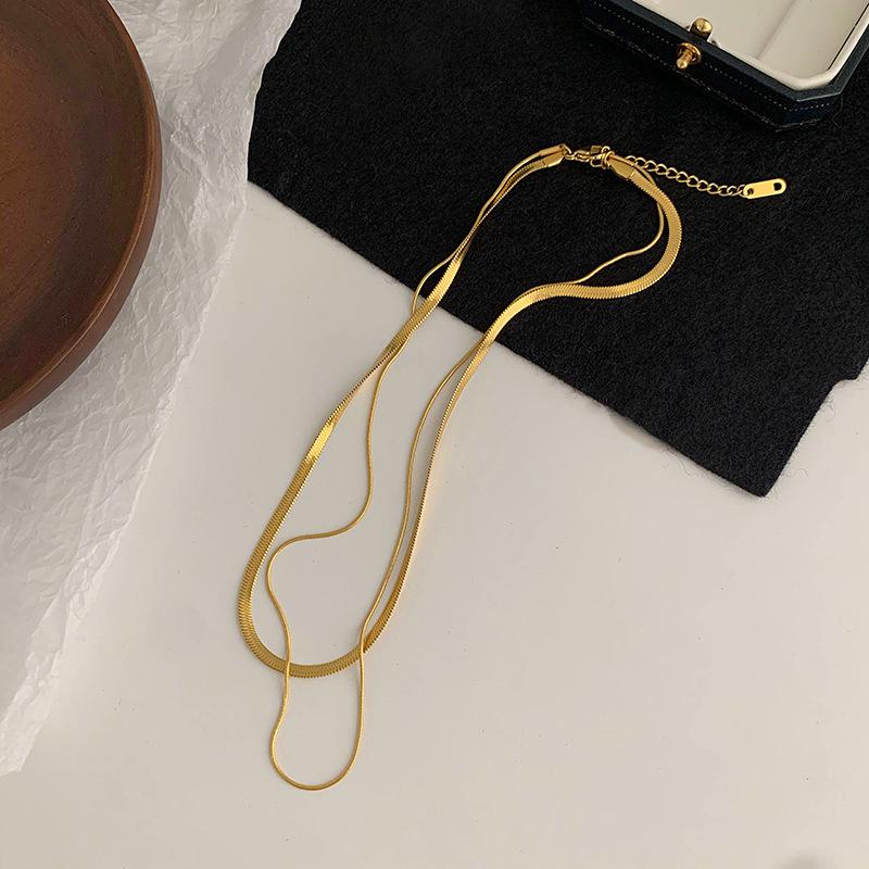 Double Layer Snake Bone Chain Necklace - Stylish Round Choker with High Color Retention, European & American Style.