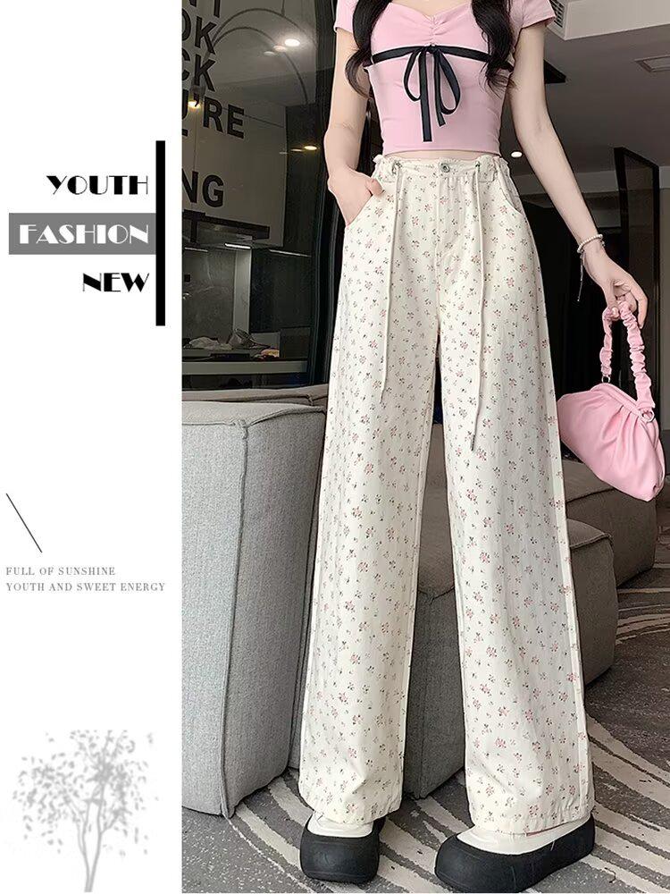 

Женские летние брюки с цветочным принтом, высокой посадкой и широкими штанинами - Стройнящие, Свободные, Длиной до пола, На кулиске, Для фигуры типа груша , Вареный деним. 3XL бежевый