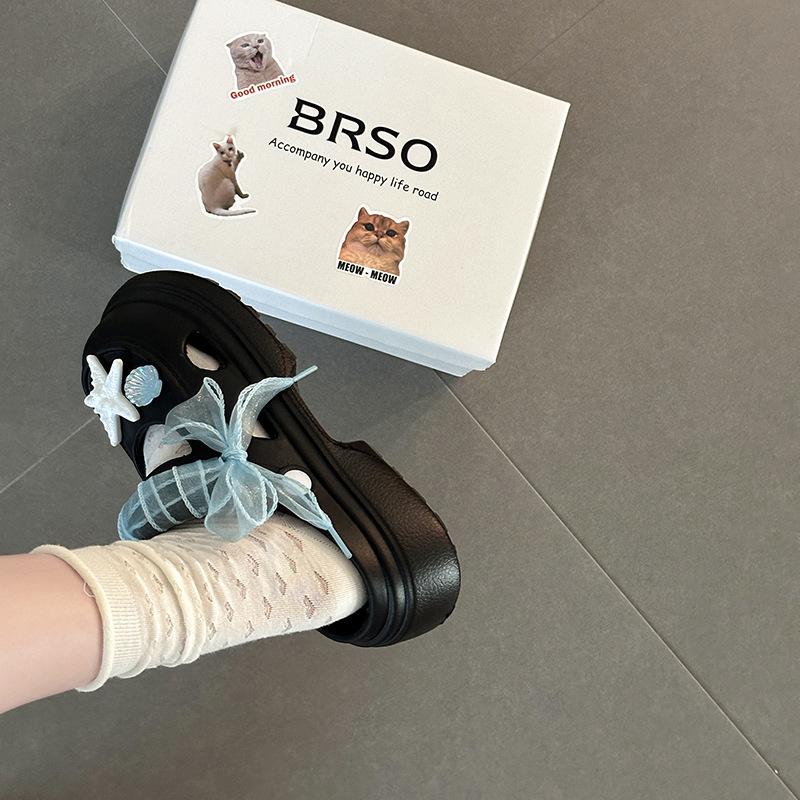 Internet celebrity explosion white heightened platform hole shoes women's 2025 new summer wear cute cartoon bag head drag tide